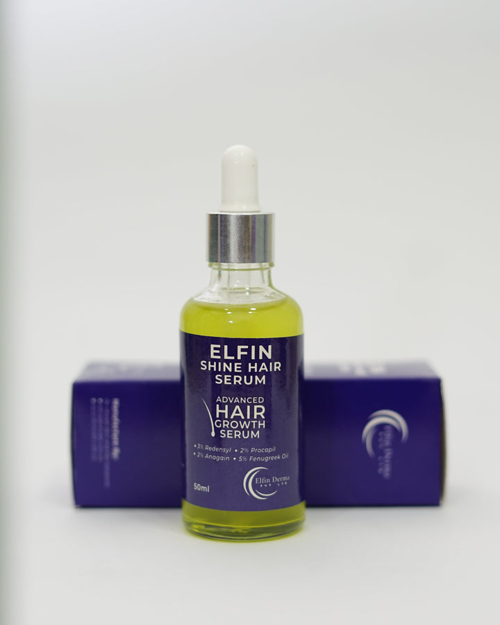 Hair serum bottle with dropper and purple container on a white background