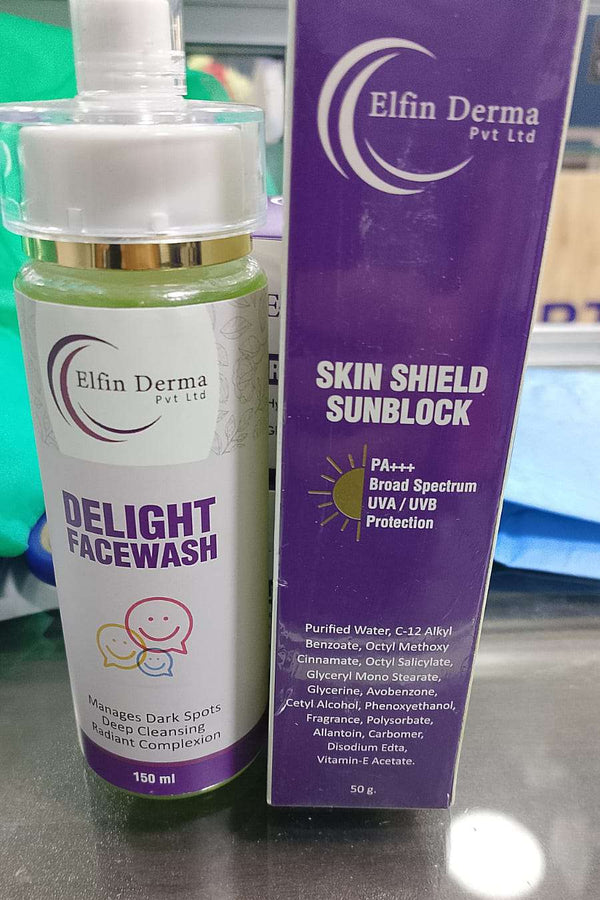 Elfin Derma Delight Facewash and Skin Shield Sunblock on a reflective surface